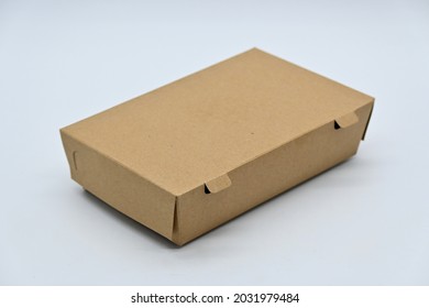 Small Brown Carton Mockup Box Packaging Which Is Usually Used For Food Packaging.