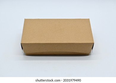 Small Brown Carton Mockup Box Packaging Which Is Usually Used For Food Packaging.