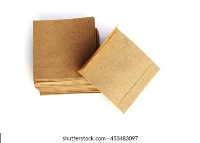 Small Brown Envelope Are Stacking On White Background