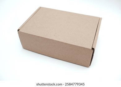 small brown paper box or cardboard box isolated on white background