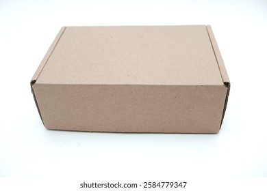 small brown paper box or cardboard box isolated on white background