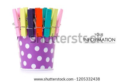 A small bucket with clothespins pattern on a white background isolation