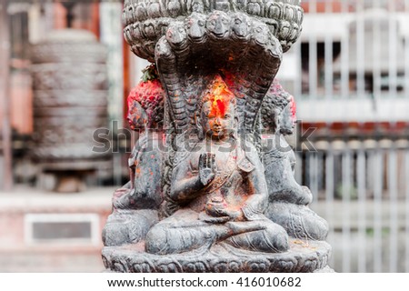 Small buddha statue in Ratnakar Mahavihar, the Kumary's Palace, in Pantan, Nepal