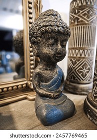 Small Buddha statues for table, interior, and aquarium decorations.