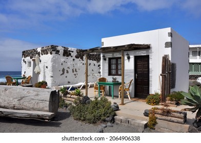 Small Bungalow On Black Lava Sand Beach On Spanish Canary Island Lanzarote, Spain