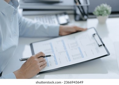 Small business accounting Businesswoman Accountant verify growing business with calculator. Accountancy Concept - Shutterstock ID 2366943649