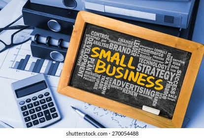 small business concept with related word cloud handwritten on blackboard - Powered by Shutterstock