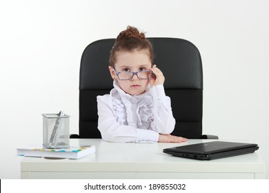 Small Business. Cute Little Girl In Glasses