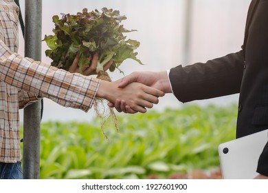 Small Business Farm Owner Agree Sell Produce To Local Food Market