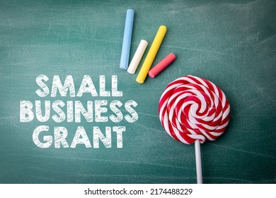 Small Business Grant. Text On A Green Textured Chalkboard.