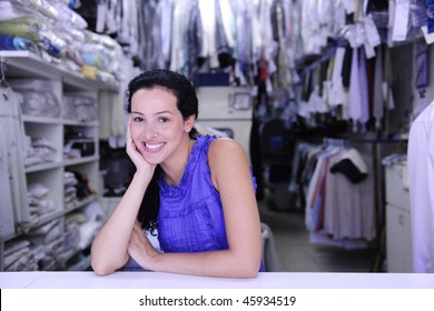 Small Business: Happy Owner Of A Dry Cleaner Store