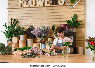 Small Business. Male Florist Making Rose Bouquet In Flower Shop. Man Assistant Or Owner In Floral Design Studio, Making Decorations And Arrangements. Flowers Delivery, Creating Order