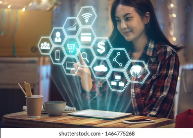 Small business online shopping, Social media marketing working at home, Asian woman select shopping online with digital tablet in home with virtual icon diagram. - Powered by Shutterstock