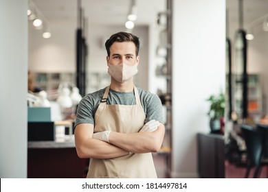 Small Business Owner. Confident Man In Protective Mask Standing At Beauty Salon Interior, Free Space