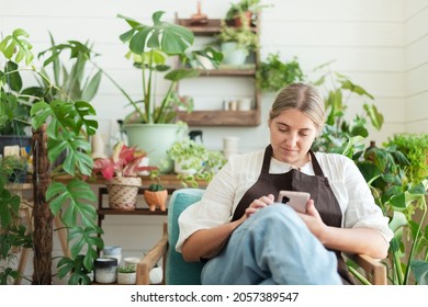 Small Business Owner Using Mobile Phone