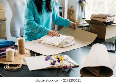 Small Business Owner Woman Packs The Goods In Eco Packaging In Office, Shop.