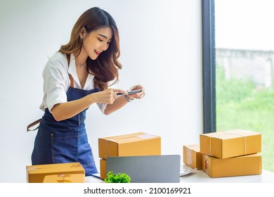 Small Business Owners Are Happy With Company Sales, Cropped Photo Of Woman Photographing Name In Front Of Her Box For Delivery At Online Sales Office, Merchandising Concept And Modern Businessman.