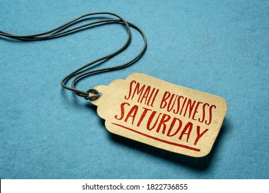 Small Business Saturday Sign - A Paper Price Tag With A Twine Against Blue Paper Background, Local Holiday Shopping Concept