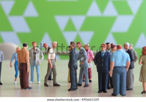a small of
businessman figure at meeting    
