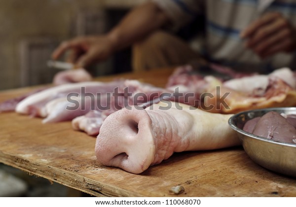 small-butchery-selling-pig-snout-600w-110068070.jpg