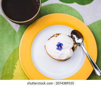 A small cake with coffee