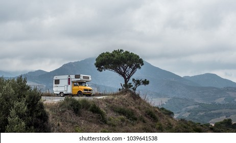 Small Camper Parked In A Scenic Location