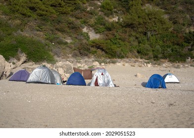 Small Camper Tents On The Sandy Beach