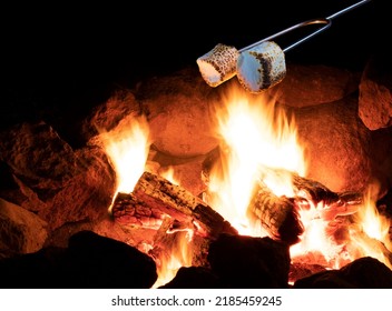 Small Campfire With Marshmallows For Smores Roasting Above