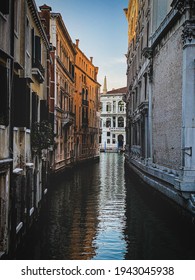 Small Canal In Venice, Italy, With Balcony, And, Blue Sky Reflexion On Water, No Boat, No People