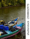 A small canoe containing equipment for fishing