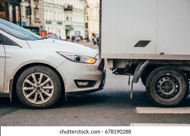 Small Car Accident, A White Sedan Crashed Into A Truck