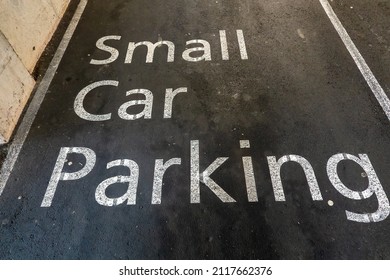 Small Car Parking Bay In Shopping Center Car Park