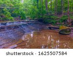 Small cascading waterfall on Deer LIck Creek just upstream from Bridal Veil Falls. Cuyahoga National park. Ohio. USA