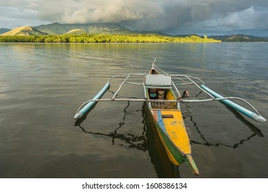 Small Catamaran On A Calm Water