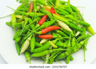 Small Cayenne Pepper. Pile Of Fresh Green And Red Bird's Eye Chili Peppers. Isolated