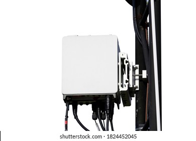 Small Cell 3G, 4G, 5G Radio System. Macro Base Station Or Base Transceiver Station. Wireless Communication Antenna Transmitter On Small Tower Outdoor Isolated On White Background.