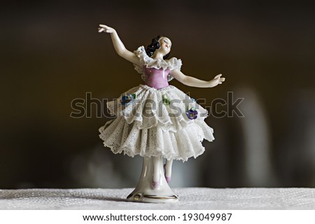small ceramic statuette dancer
