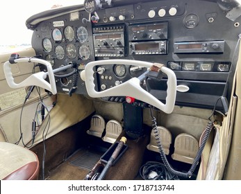 Small Cessna Plane. The Cockpit, The Propeller And The Landing Gear Of The Light Aircraft. Piston Powered Aircraft