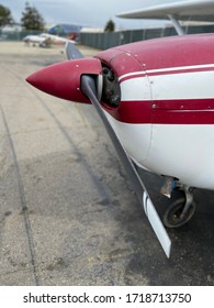 Small Cessna Plane. The Cockpit, The Propeller And The Landing Gear Of The Light Aircraft. Piston Powered Aircraft