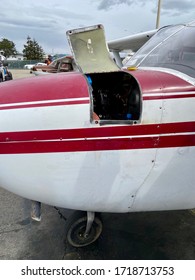 Small Cessna Plane. The Cockpit, The Propeller And The Landing Gear Of The Light Aircraft. Piston Powered Aircraft