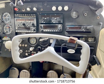 Small Cessna Plane. The Cockpit, The Propeller And The Landing Gear Of The Light Aircraft. Piston Powered Aircraft