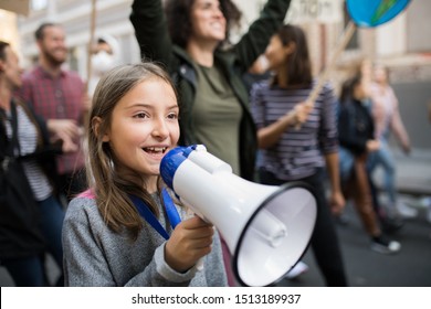 Small Child With Amplifier On Global Strike For Climate Change.