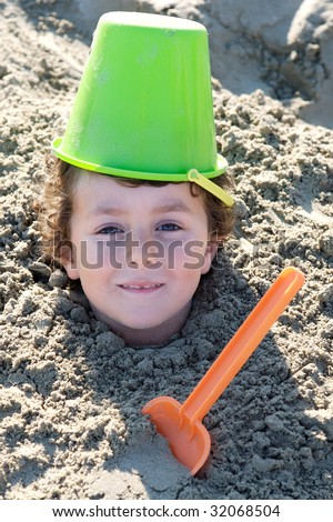 Similar – Image, Stock Photo Small child buried in the sand of the beach