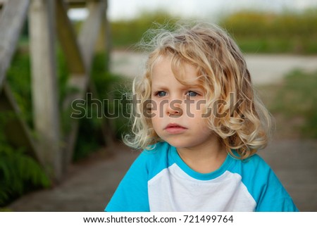 Similar – Small child with long blond hair