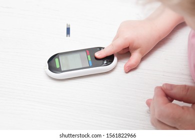 Small Child Presses The Button Glucose Meter, Blood Glucose Meter, Childhood Diabetes, Child Health Care