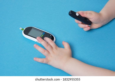 Small Child Presses The Button Glucose Meter, Blood Glucose Meter, Childhood Diabetes, Child Health Care