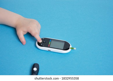 Small Child Presses The Button Glucose Meter, Blood Glucose Meter, Childhood Diabetes, Child Health Care