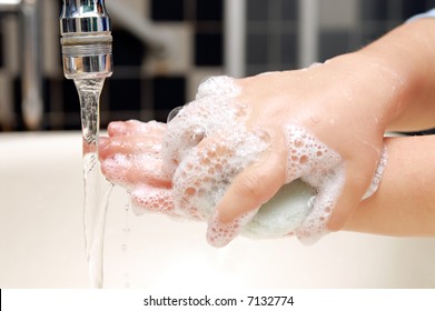 Small Child Washing Hands With Soap And Water, Detail