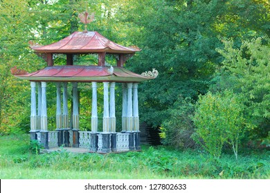 Small Chinese Arbour in a green forest park - Powered by Shutterstock