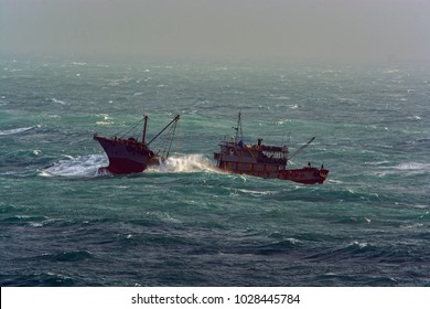 Small Chinese Trawler Pounds Through Rough Seas As It Crosses The South China Sea.